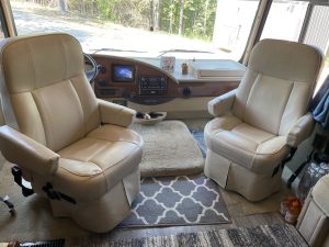 2013 winnebago 30t leather captions chairs towards dining area